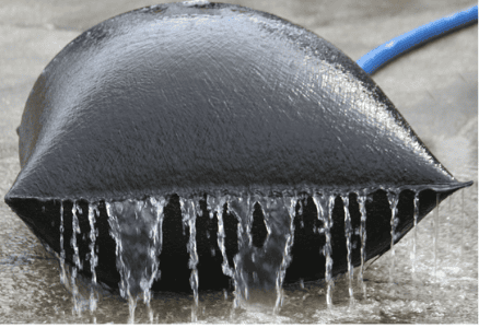 Dewatering Bag for Sediment Filtration and Construction Site Dewatering Dewatering bag filtering sediment-laden water as clean water drains through the geotextile fabric during construction site dewatering.